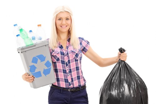 Technicians handling hazardous waste materials