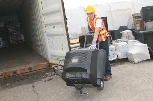 Mini skip being delivered to a residential area
